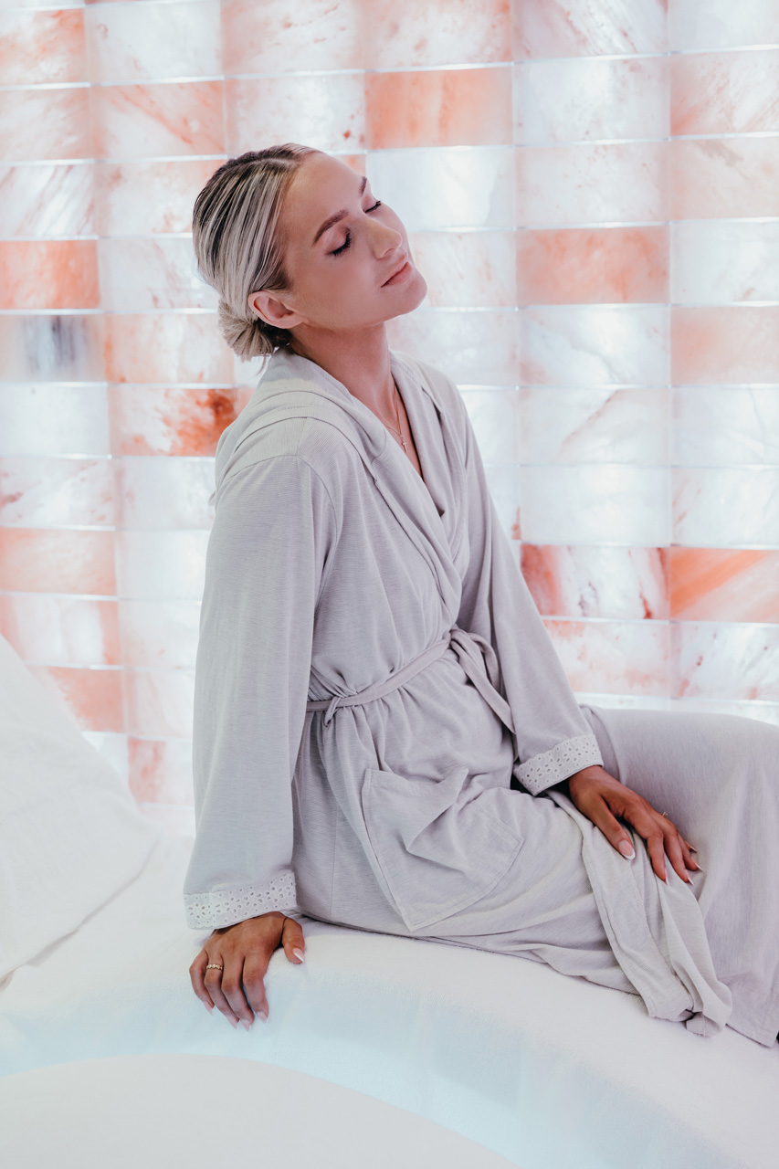 Relaxing in the glowing salt room at SALT of Palmar.