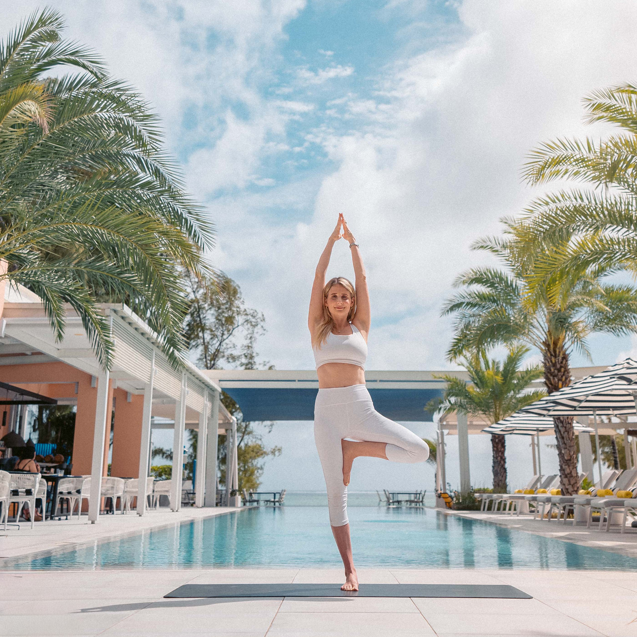 Morning yoga by the pool at SALT of Palmar.