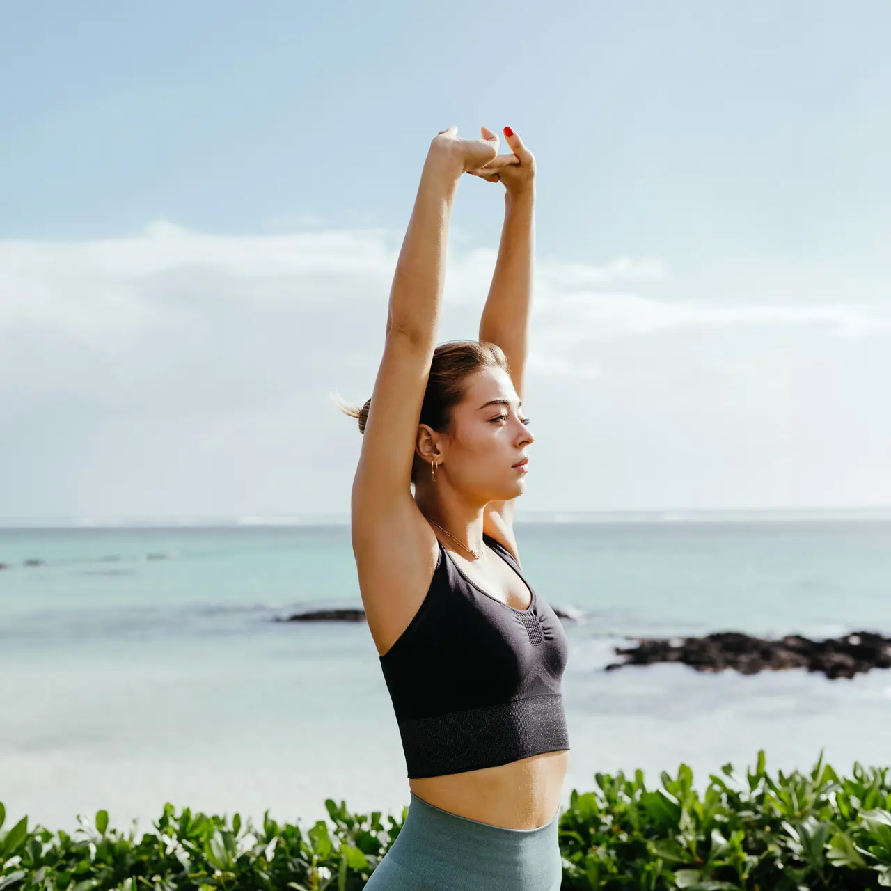 Sunrise yoga by the beach.