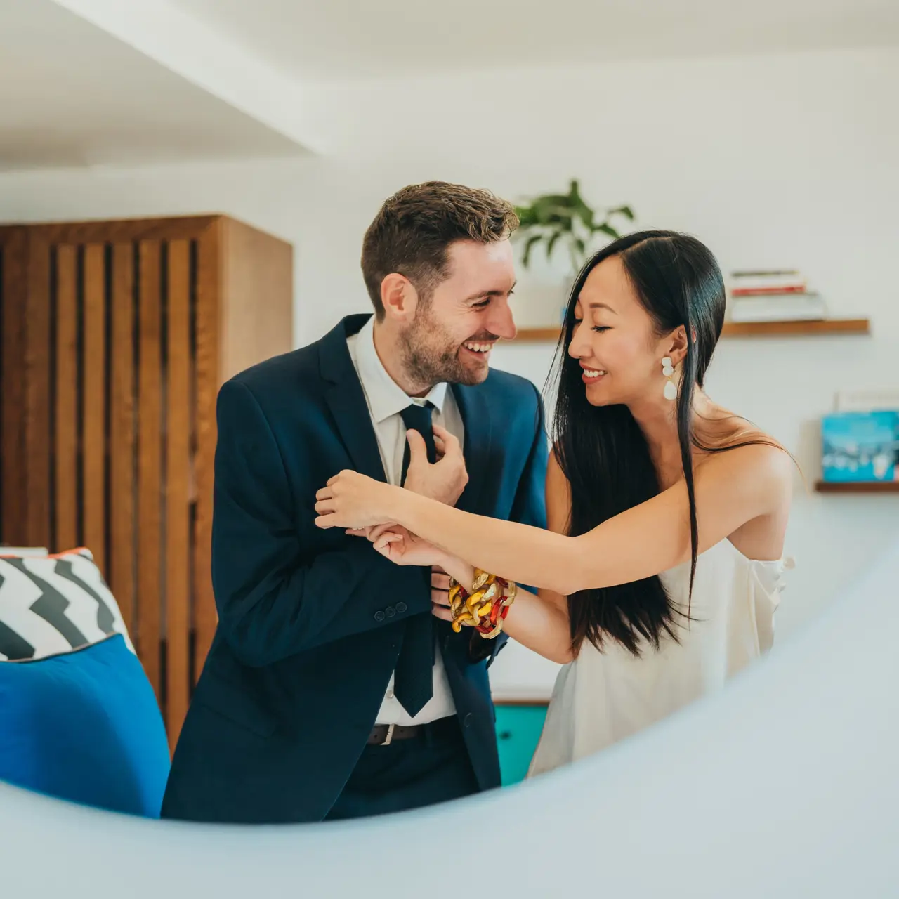 Newlyweds sharing a joyful moment before the ceremony.