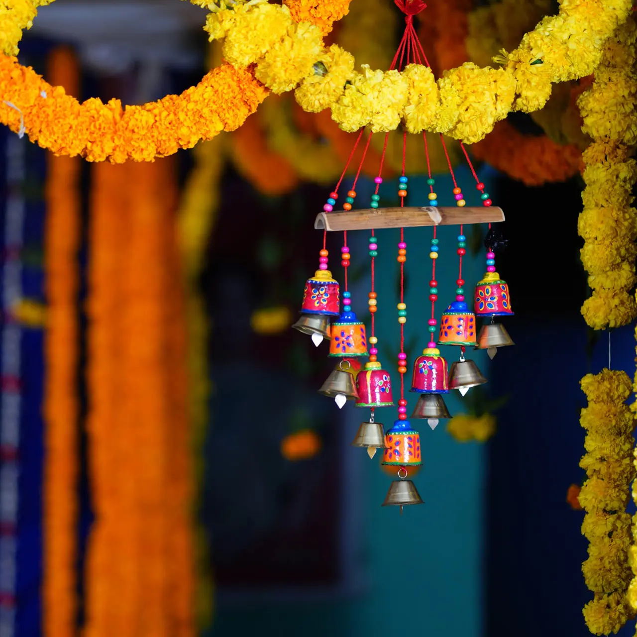 Colourful temple bells and flower garlands.