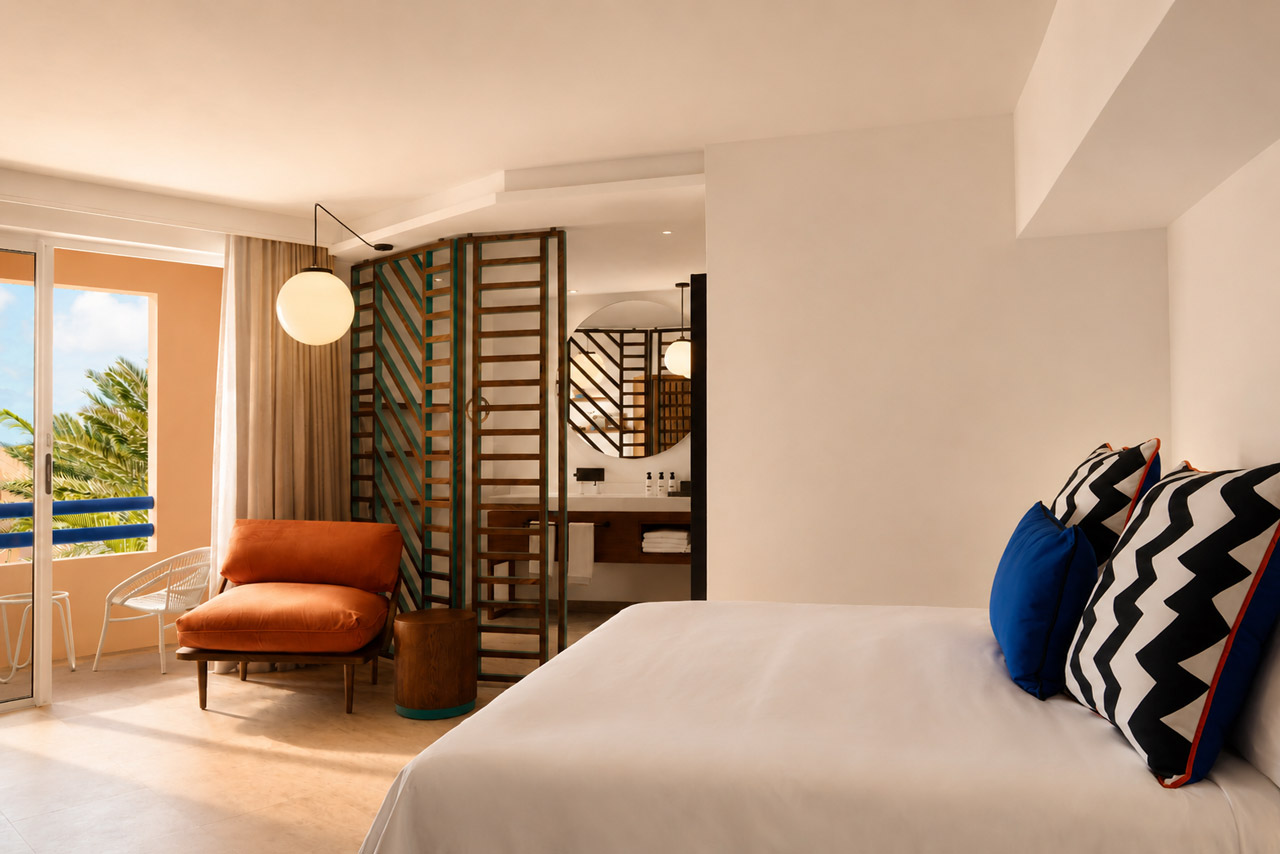 Seaview room with contemporary interiors, cosy seating area and private balcony.