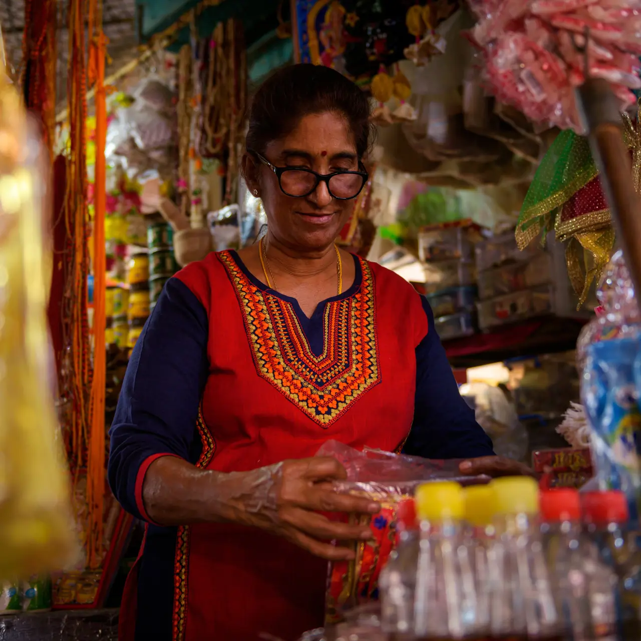 Local shopkeeper at Mahébourg Market.