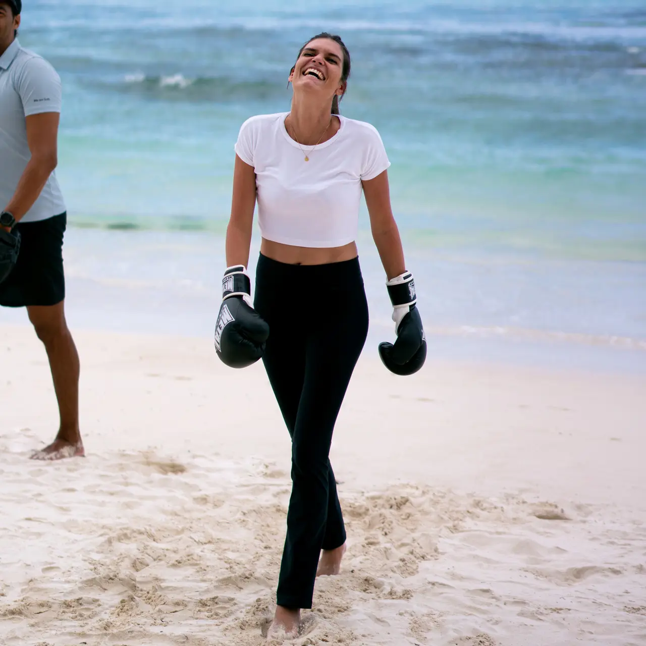 Guest boxing on the beach.