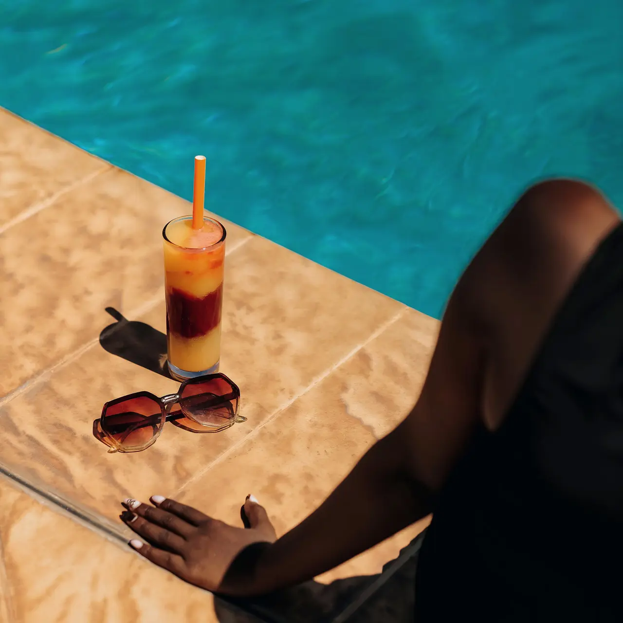 Tropical cocktail by the pool at SALT of Akagera.