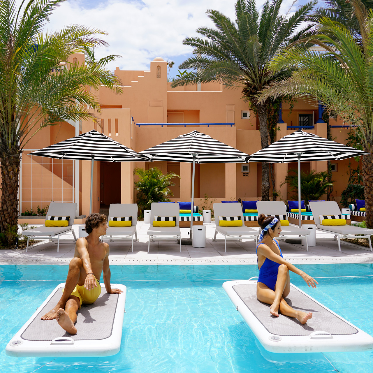 Guests practising Float Fit in the pool.