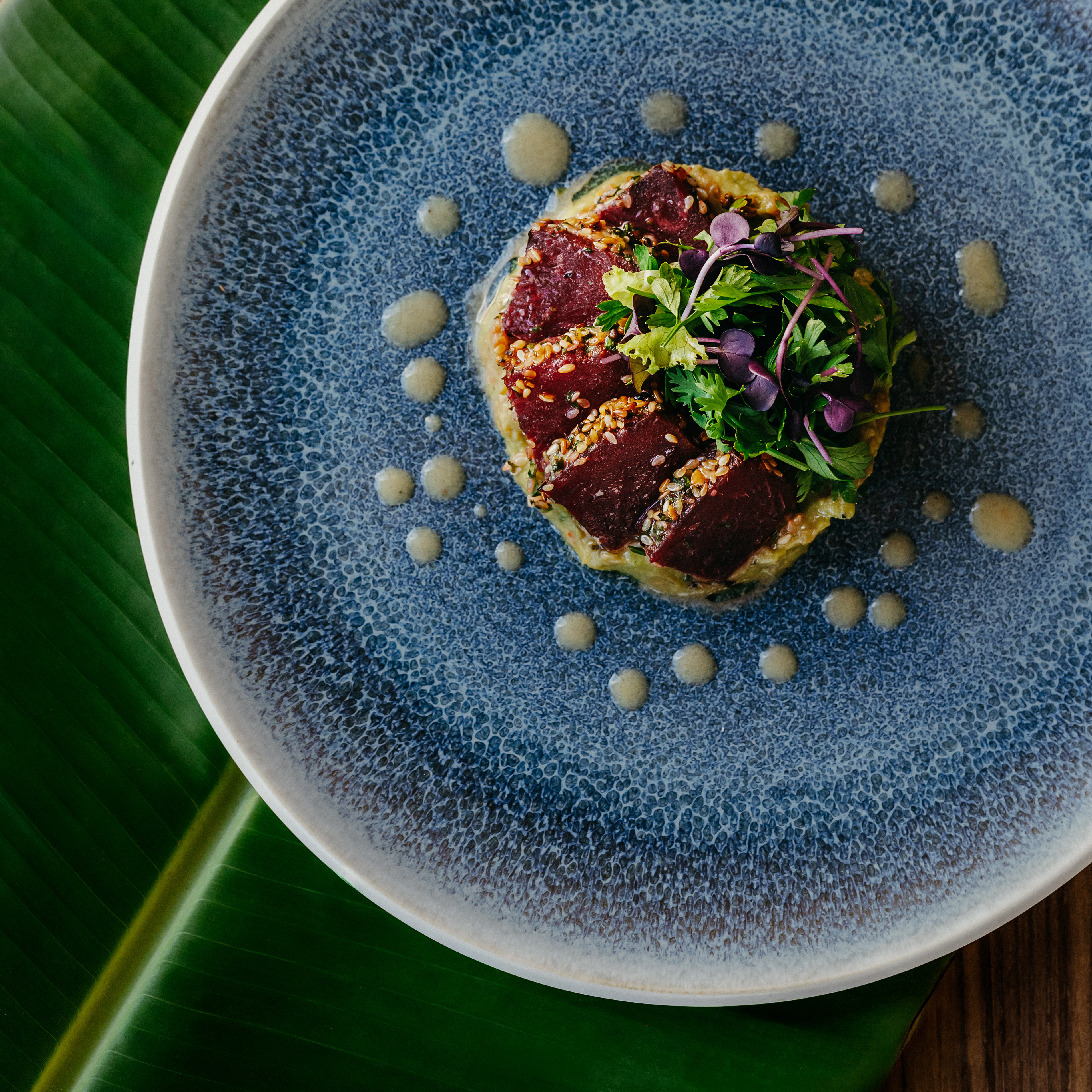 Seared beetroot dish with fresh herbs at Tek Tek.